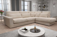 Canapé Ambre côtelé en velours écru, idéal pour moments de détente et cocooning, dans un intérieur moderne.