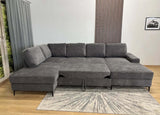 Canapé panoramique VIENNA en U, convertible avec 2 coffres intégrés, en tissu gris, idéal pour un salon moderne.